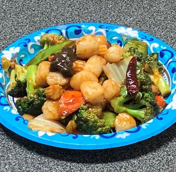 123. SCALLOPS W. GARLIC SAUCE